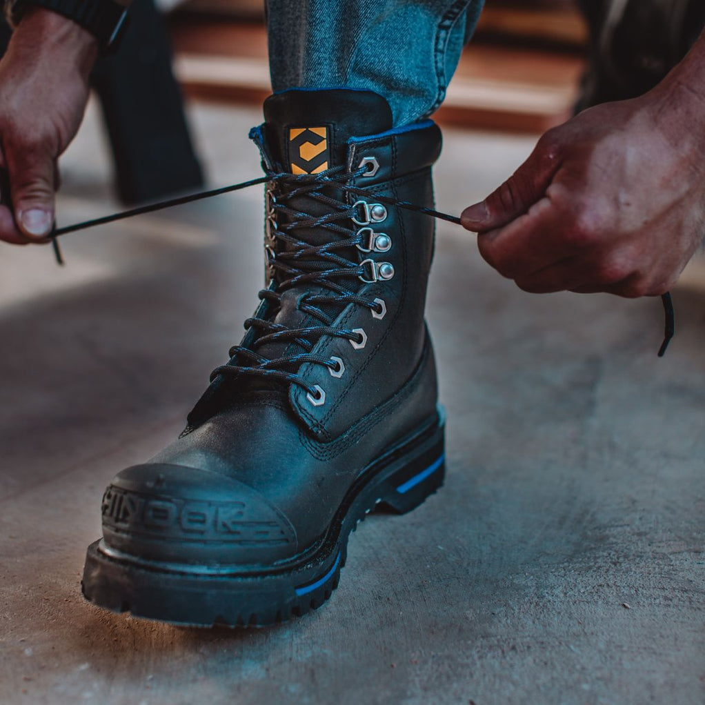 A man lacing up the Tarantula 8