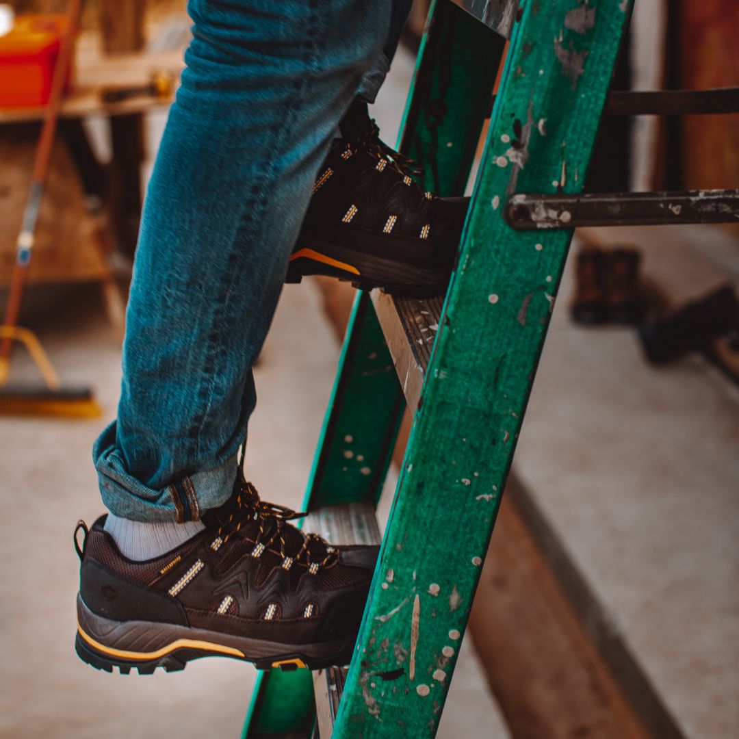 Climb stairs with confidence in the Sierra Low Composite Toe Men’s Waterproof Hiker Boot, designed for safety and stability.